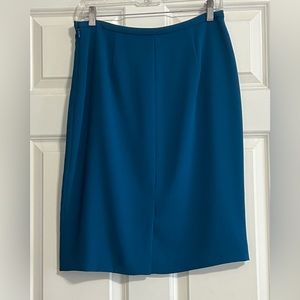 Ellie Tahiri deep teal blue with back. Split Sz: 6